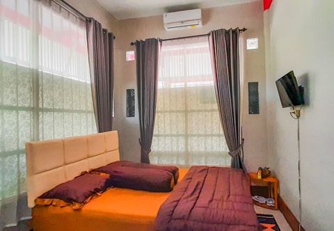 Bedroom OYO 90374 De' Orange Syariah