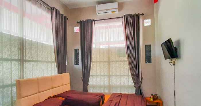 Kamar Tidur OYO 90374 De' Orange Syariah