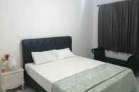 Bedroom OYO 90384 Bukit Cipendawa Mc