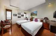 Phòng ngủ 4 Viet Village Hotel & Travel