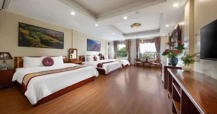 ห้องนอน Viet Village Hotel & Travel