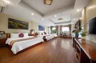 ห้องนอน Viet Village Hotel & Travel