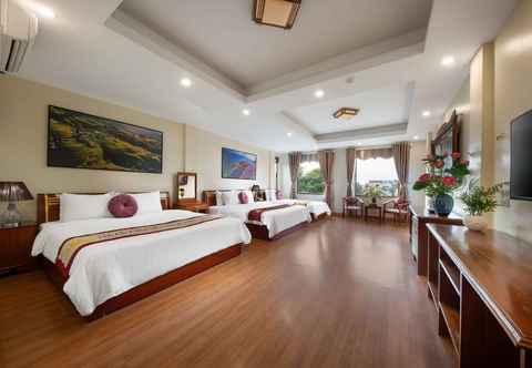 Phòng ngủ Viet Village Hotel & Travel