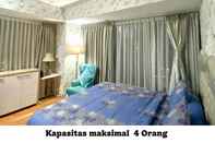 Bedroom Apartemen Grand Kamala Lagoon by Fortune88