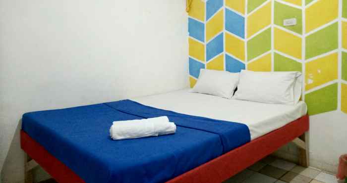 Bedroom OYO 90392 Joy House & Cafe Syariah