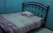 Kamar Tidur 7 Srikandi Guest House Medan