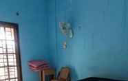 Kamar Tidur 6 Srikandi Guest House Medan