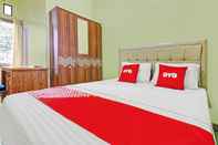 ห้องนอน OYO 90409 Kostawira Residence Syariah