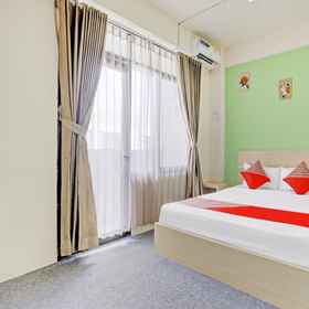 Bedroom 1 PW Suites Samarinda, Banjar Fried Chicken Hotels