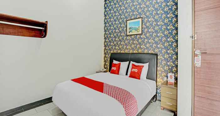 Bedroom OYO 90396 The Halona Villa Batu 