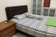 Kamar Tidur OYO 90427 Greenhouse Homestay Syariah