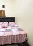 BEDROOM SPOT ON 90435 Rohana Homestay Syariah