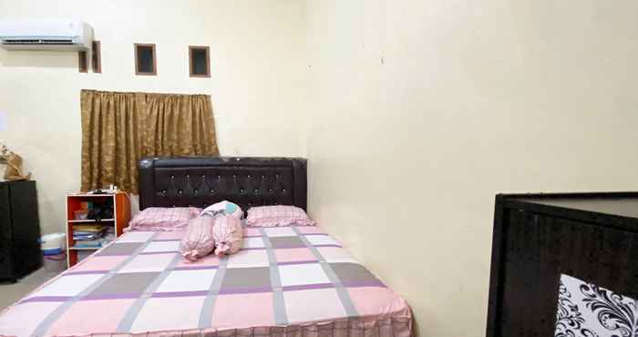 Bedroom SPOT ON 90435 Rohana Homestay Syariah