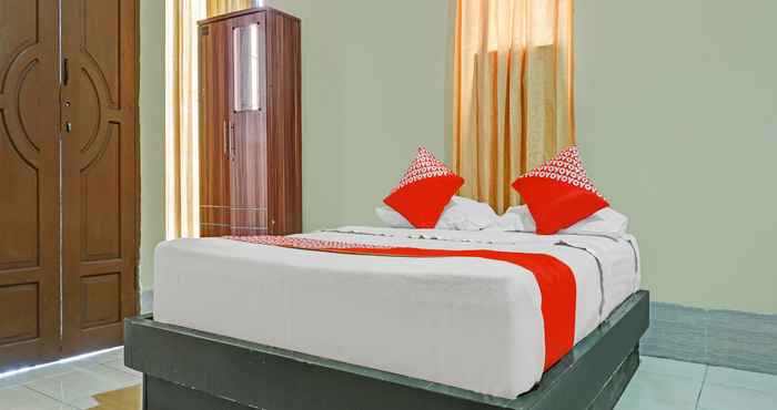 Bedroom OYO 90441 Kuntawa Guesthouse