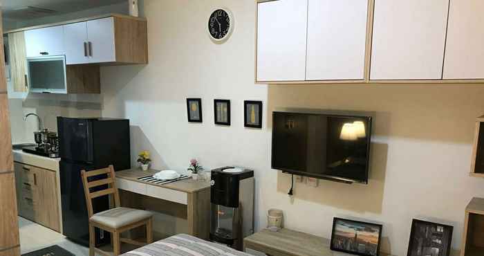 ห้องนอน Juragan Apartment at Springwood Residence