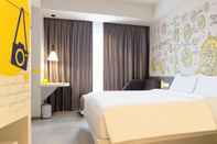 Bedroom YELLO Hotel Jambi