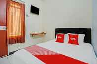 Kamar Tidur OYO 90462 Madasia House