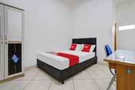 Kamar Tidur OYO 90478 Losmen Ayu