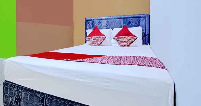 Kamar Tidur OYO 90476 Iksan Homestay Syariah