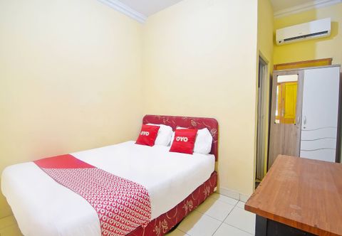 Bedroom OYO 90463 A2b Guesthouse