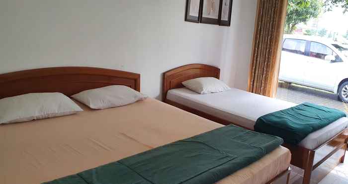 Kamar Tidur OYO 90481 Vanda Guest House Batu