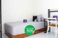 Bedroom Singgahsini Sulawesi Residence Mlati Sleman Yogyakarta