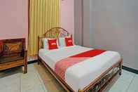 Kamar Tidur OYO 90488 Harwin Homestay