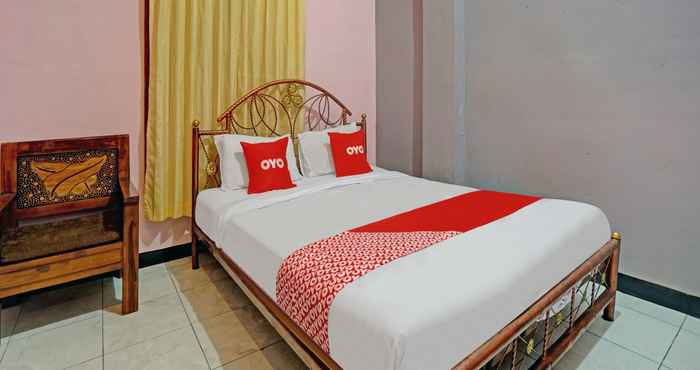 Bedroom OYO 90488 Harwin Homestay