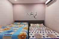 ห้องนอน Jiaxin Homestay Putri Wangsa