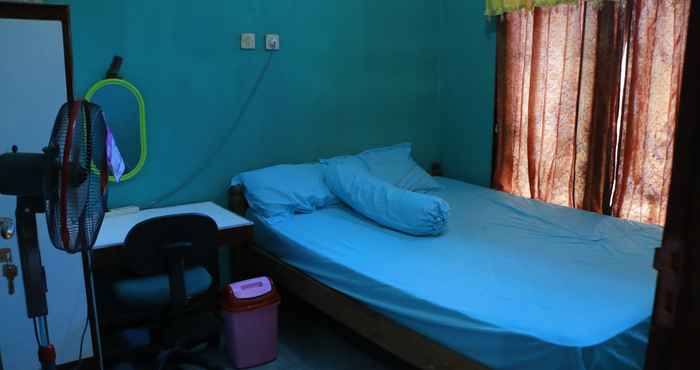 Phòng ngủ Sarjuni Homestay