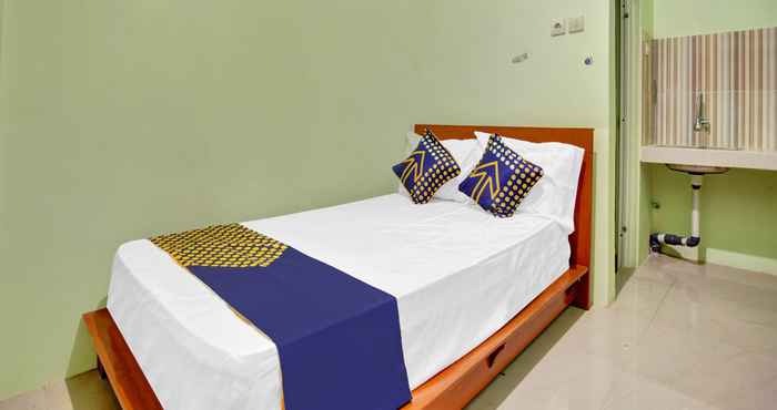 Kamar Tidur SPOT ON 90537 De Wisma Emas