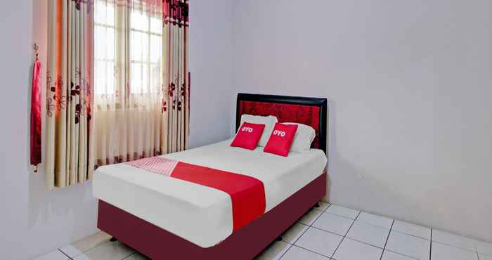 Kamar Tidur OYO 90543 An-nur Guest House Syariah