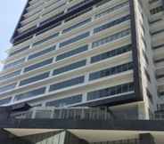 Bangunan 2 Capital O 804 The Residences at Bonifacio Civic Center