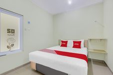 Bedroom OYO 90549 Tumesa Homestay