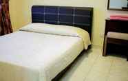 Bedroom 7 OYO HOME 90301 Suria Service Apartments @ Bukit Merak Laketown Resort