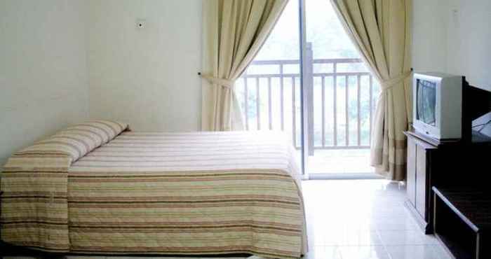 Bedroom OYO HOME 90301 Suria Service Apartments @ Bukit Merak Laketown Resort