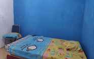 Kamar Tidur 4 Gini Homestay