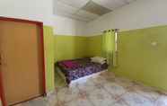 Bedroom 3 OYO 90302 Dimuara Chalet Tok Bali