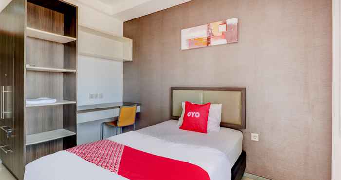 Bedroom OYO 90563 Socialite Dago Asri