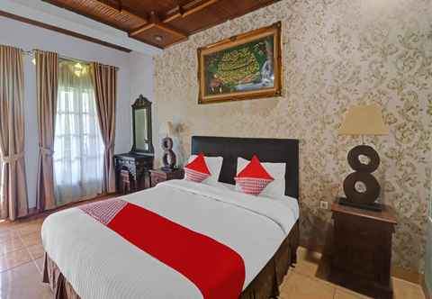 Bedroom OYO 113500 Hotel R Cantika Syariah