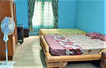 Phòng ngủ 4 Ndalem Pakdhe Homestay