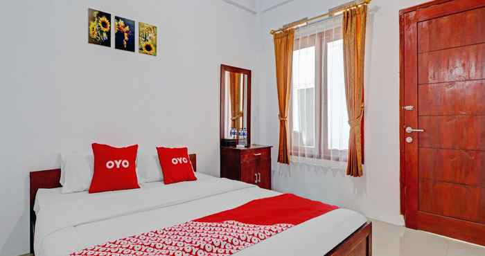 Bedroom OYO 90570 Heboh Guest House Syariah