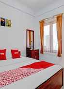 BEDROOM OYO 90570 Heboh Guest House Syariah