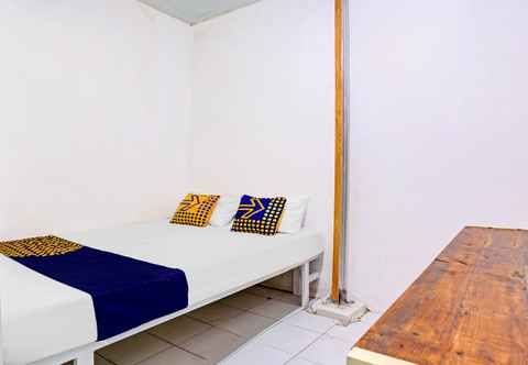 Bedroom SPOT ON 90586 Hagawa Syariah Homestay