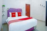 Kamar Tidur OYO 90587 Domen Homestay Syariah