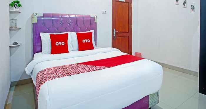 Phòng ngủ OYO 90587 Domen Homestay Syariah