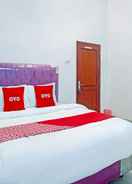 BEDROOM OYO 90587 Domen Homestay Syariah