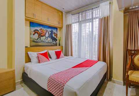 Kamar Tidur OYO 90506 Bunga Sonsang Homestay Syariah