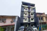 Bangunan The Budget Inn (8433 Apartment)