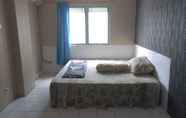 Bedroom 5 Daddy's Room Apartemen City Park